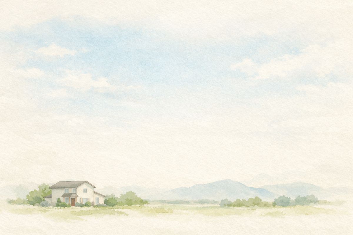 空と風景の中に静かに佇む住宅の水彩イラスト