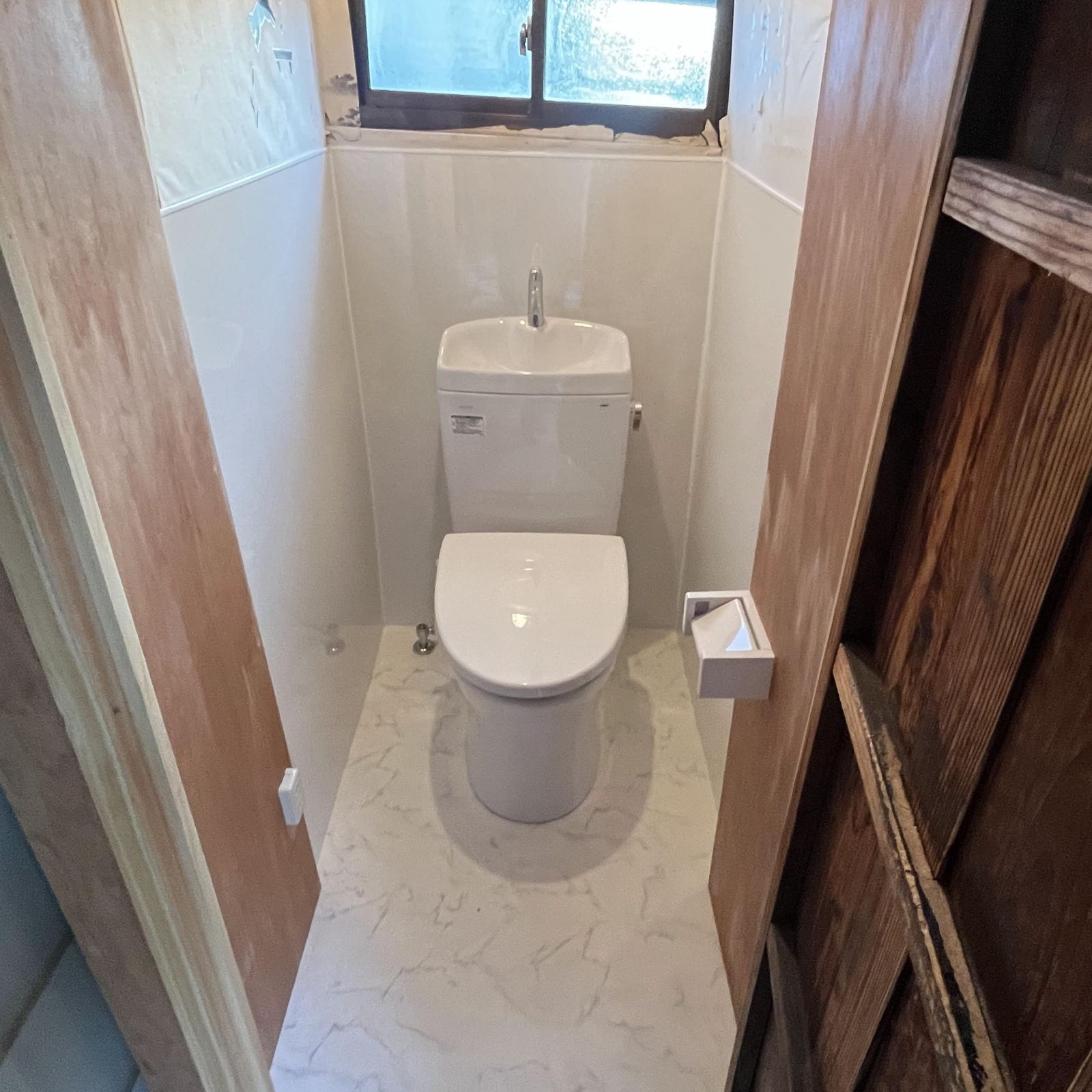 和式トイレから洋式へ変更し空間を広くしたリフォーム後のトイレ
