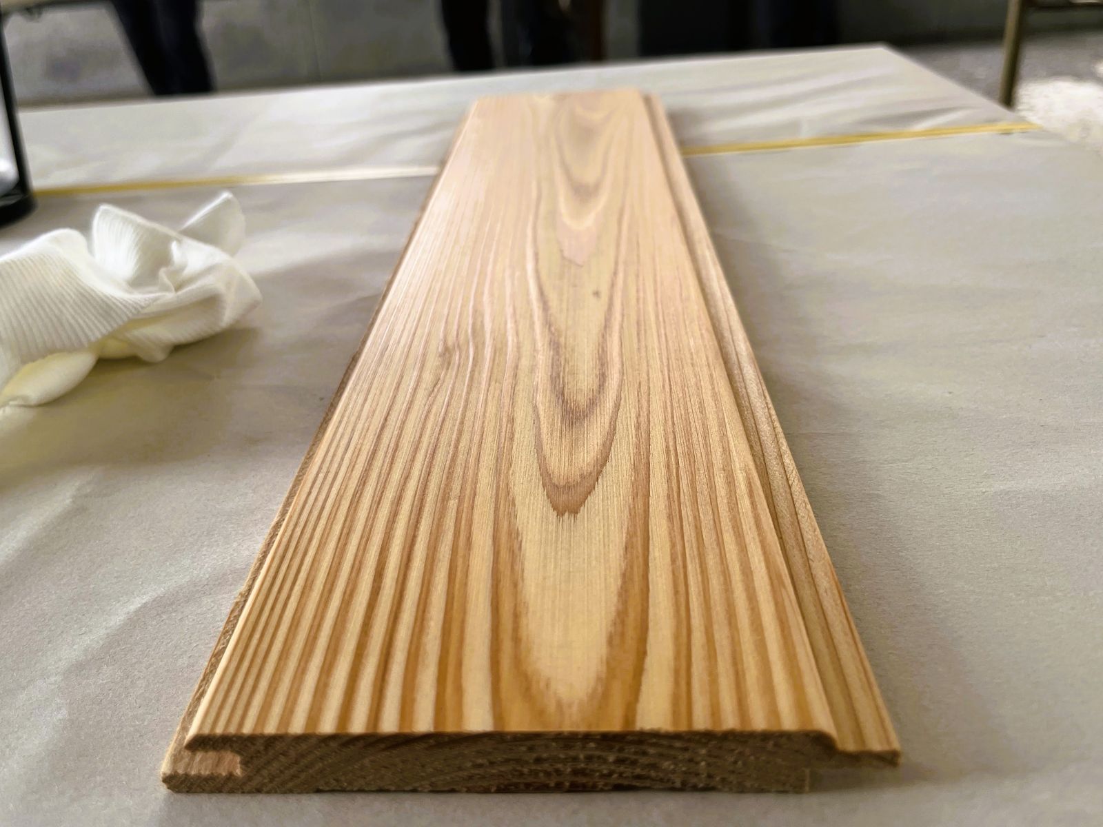 ファインクリスタルコートforWOOD遮水工法施工後の木材サンプル